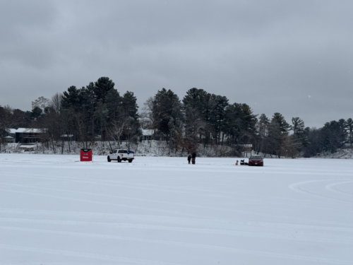 Group ice fishing on lake wissota