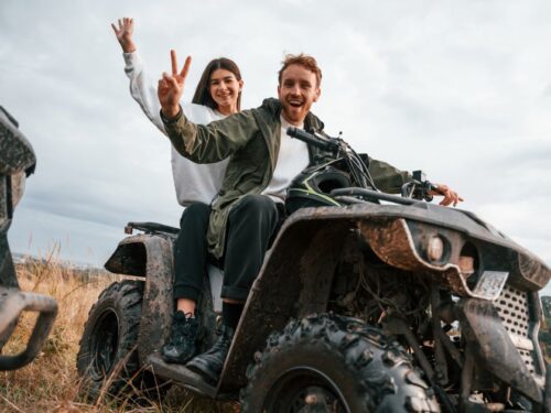 2 People on ATV Smiling