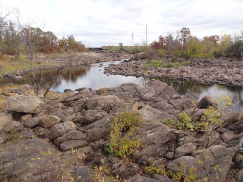 area-178-riverview-reserve fall colors behind beautiful rocks and water