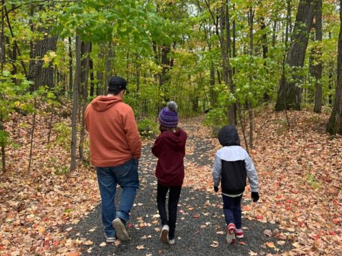 Family walking on Ice Age Trail during the fall