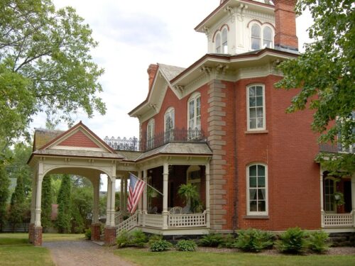 Old brick house with Victorian Italianate era architecture