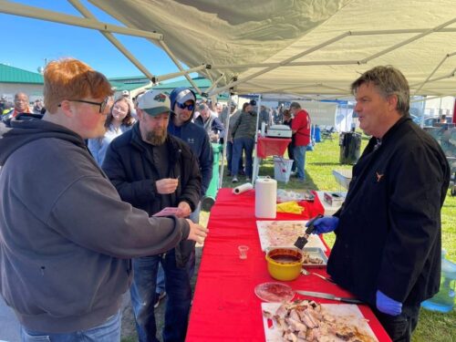 Man Sampling BBQ Sauce at BBQ Fest