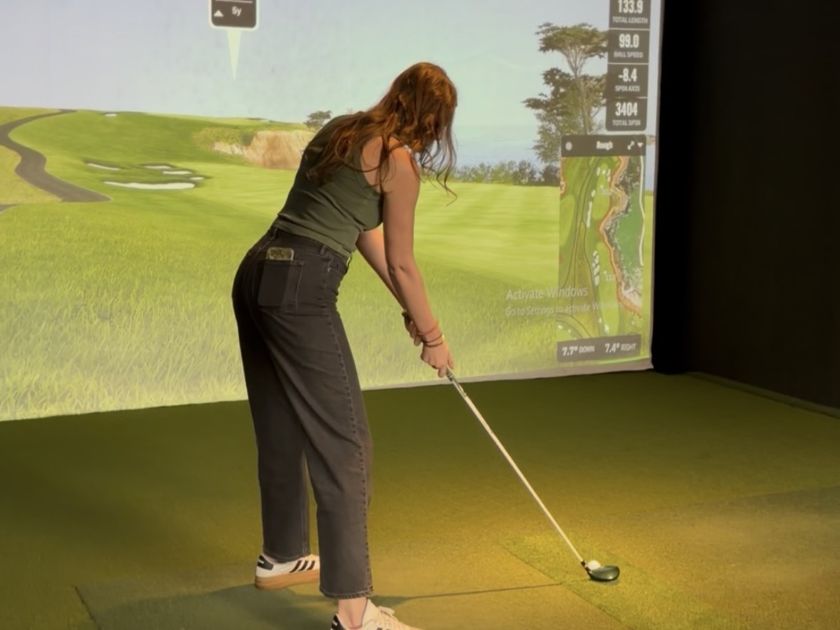 Woman practicing Golf at Golf 365